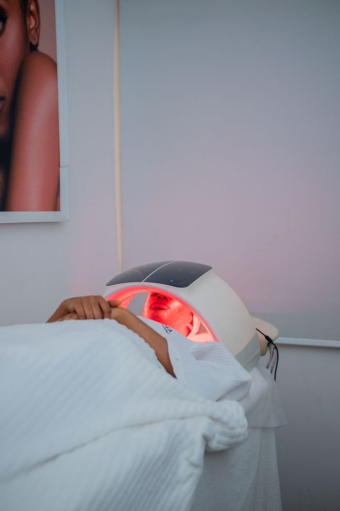 Services A relaxing LED light therapy treatment at a modern spa in Abuja, Nigeria.